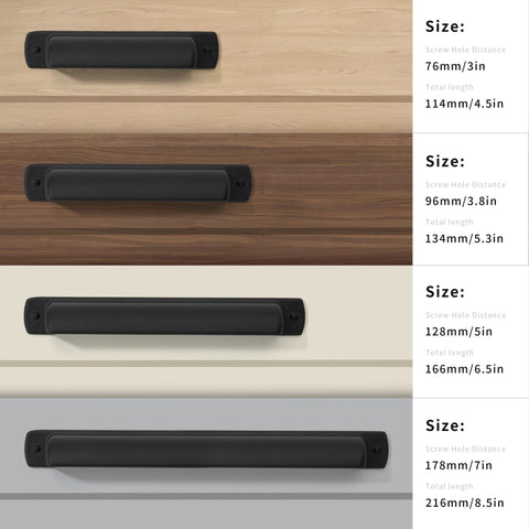 Four matte black cup drawer pulls in varying sizes displayed on wood surfaces with dimensions labeled on the right.