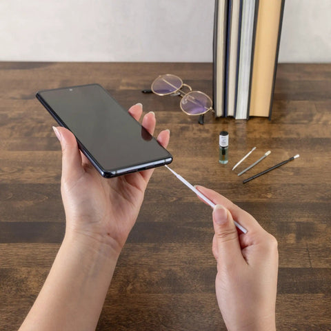 Using Phone Laptop Tablet All In One Cleaning Kit With Precision Spudgers Angled Tweezers DeoxIT D100L on a smartphone