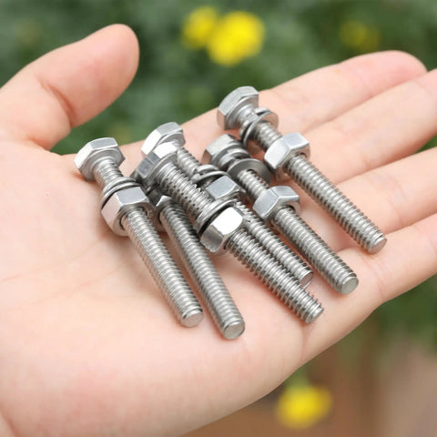 Kickass 10 Pack Of 1/4-20 X 2 Inch Stainless Steel Hex Bolts And Nuts With Washers in hand, showcasing rust-resistant hardware.