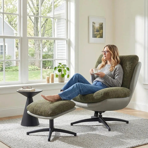 Woman relaxing in Oversized 360 Degree Swivel Accent Chair With Ottoman, Heavy Duty 400 Lbs Capacity, in grey in modern living room.