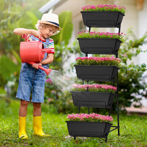 Child watering flowers in a Five Tier Vertical Garden Planter For Balcony Or Patio No Bend Ergonomic Design Space Saving Raised Garden Bed, black.