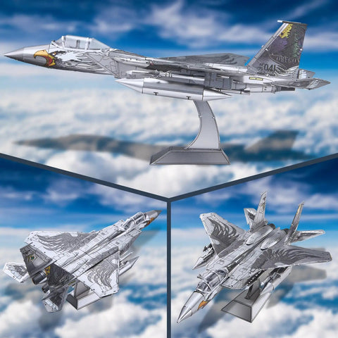 F-15 Fighter Jet Metal Model Kit for Adults, DIY 3D Puzzle to Build at Home, mounted and flying over clouds on display stand.