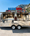 Kickass 10 Foot Stainless Steel Food Trailer Rocking A Slick Mirror Exterior And Completely Loaded Mobile Catering Kitchen Built For Crushing Real Daily Sales with open serving windows.