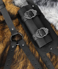 2 In 1 Faux Leather Medieval Shoulder Armor With Back Sword Frog for LARP Cosplay showing vintage style finish on fur backdrop
