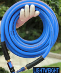 Hybrid Air Compressor Hose Quarter Inch By 25 Feet Built Tough Yet Super Lightweight Flexible Tubing With Aluminum Quick Coupler Universal Push Lock Industrial Plug Blue coiled with aluminum fittings in a hand.