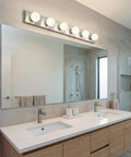 Top Shelf 36 Inch Bathroom Vanity Light Fixture With Brushed Nickel Finish Offering Straight Up Easy Installation And Rock Solid Build Quality For 6 Light Damp Rated Rooms above a modern bathroom sink.