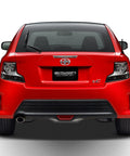 Rear view of red Scion tC showing Scion Compatible 7 Inch Rubber Antenna Mast Replacement With Copper Coil Weatherproof Durable.