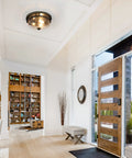 Farmhouse Flush Mount Ceiling Light With Faux Wood Finish And Seeded Glass Shade in modern living room entryway.