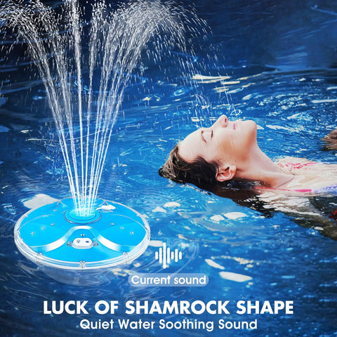Blue Remote Control Floating Pool Fountain With Lights spraying water near person in pool, 4.3 ft spray height; anchor included.