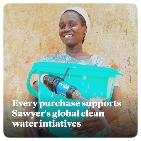 Person holding a blue water bucket with filtration system, promoting Sawyer's global clean water initiatives.
