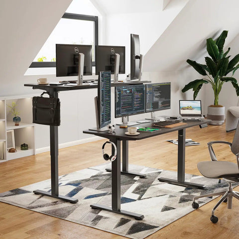 Solid Electric Adjustable Standing Desk With 40x24 Inch Tabletop, workspace with multiple monitors and a folding corner table.