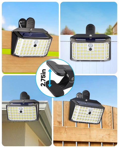 Super Bright 176 Lumen Solar Clip On Fence Lights With Motion Sensor mounted on a fence, showcasing clip design and solar panel.