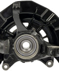 Front view of a black Front Driver Side Wheel Bearing And Hub Assembly For Select Toyota Models OE Fix All In One Loaded Knuckle Kit Pre Pressed