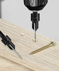 Close-up of Eight Piece Woodworking Countersink Drill Bit Set Three In One With Eighty Two Degree Chamfer drilling wood.