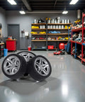 Four Piece 48MM Rubber Toy Car Wheel Set For RC Models in a garage, showing dope black simulation wheels with snap installation