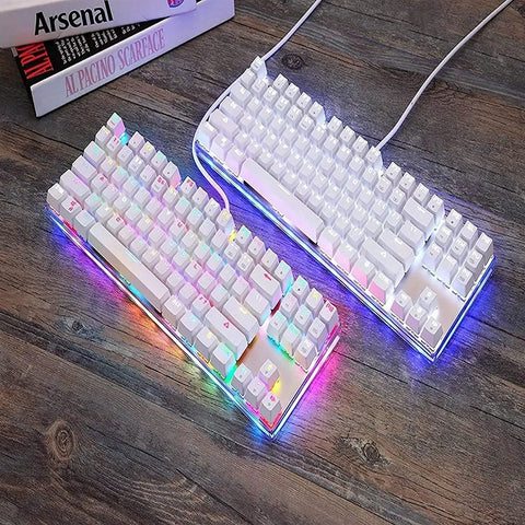 Legit Wired Gaming Keyboard With Hella Smooth Mechanical Feel And Straight Fire RGB Rainbow Backlight Featuring Nine Custom Lighting Modes Plus Six Key N Key Rollover And Multimedia Keys For Ultimate Windows Pc Gaming Setup on a wooden desk.
