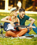 Couple enjoying outdoors with 39 Inch Full Size Electric Guitar Starter Pack With Amp Nylon Carrying Case and Accessory Kit Blue for Beginners