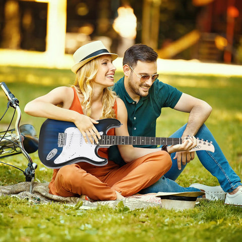 Couple enjoying outdoors with 39 Inch Full Size Electric Guitar Starter Pack With Amp Nylon Carrying Case and Accessory Kit Blue for Beginners