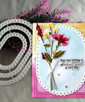 Image of Three Piece Lace Oval Metal Die Cuts Set with Stitched Nesting Tag Frames used in a handmade birthday card with floral design.