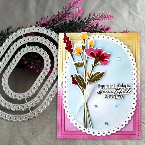 Image of Three Piece Lace Oval Metal Die Cuts Set with Stitched Nesting Tag Frames used in a handmade birthday card with floral design.