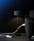 360 Degree Rotating Flat Extension Cord With 6 Ft Length, 3 Outlet Grounded Power Cord, 16 AWG UL Certified, installed behind sofa.