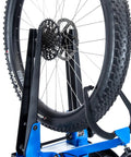 Pro Bicycle Wheel Truing Stand For Oversized Tires And Wheels, Heavy Gauge Steel, Powder Coated Finish, with mounted bike wheel