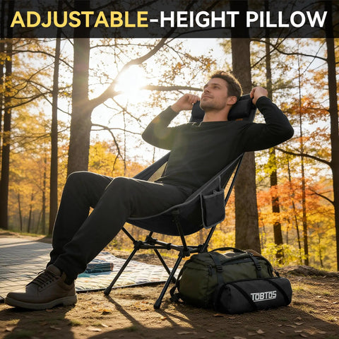 Man relaxing in Ultra Lightweight Portable High Back Camping Chair With Head Support 440 Lbs Capacity, outdoor setting.
