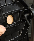 User adjusting the control panel on the Top Notch Benchtop Drill Press 1.5 HP 110V with touch screen and precision depth control.
