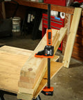 Heavy Duty Twist Lock Bar Clamps Set, 12 Inch Precision Wood Clamps in woodworking shop on wooden boards