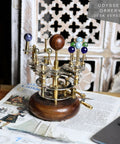 Antique Brass Orrery Desk Model, Handcrafted Vintage Gear System With Planetary Orbits From Mercury To Moon on table