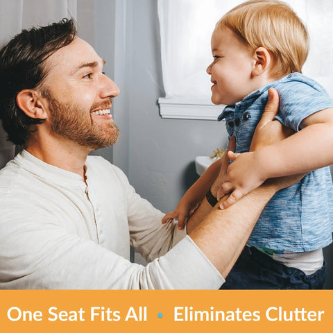 Father holding toddler in bathroom, promoting Elongated White Toilet Seat With Built In Potty Training Seat Slow Close Removable
