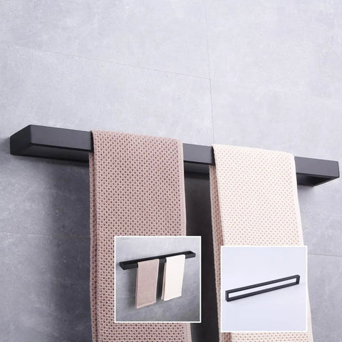 24-Inch Dope Matte Black Bathroom Towel Bar Stainless Steel Towel Rack Wall Mount holding towels on tiled wall