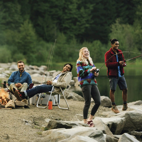 Group enjoying fishing by a lake with Roam Spincast Reel And Telescopic Fishing Rod Combo With Extendable 18.5 Inch To 6 Foot Pole Comfort Grip Handle Quickset Anti-Reverse No Tangle Design Ready To Fish Seafoam.