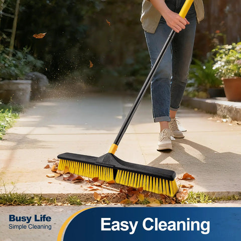 Heavy Duty 24 Inch Push Broom With Adjustable Telescoping Handle Up To 65 Inches used for sweeping leaves on pavement.