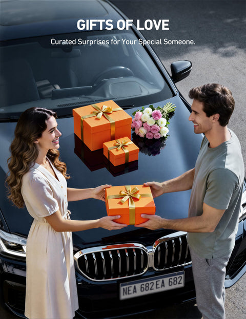 Two people exchanging gifts on a car hood with orange gift boxes and flowers, labeled 'Gifts of Love', outdoor scene