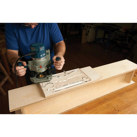 Woodworker using Top Shelf Cleaver Style Cutting Board Router Template, Heavy Duty Clear Acrylic Charcuterie Jig.