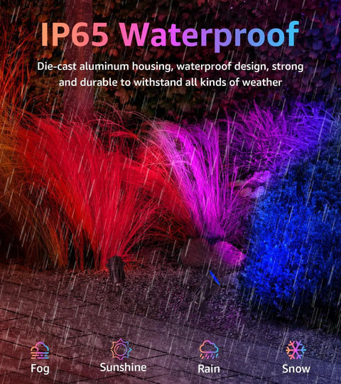 IP65 waterproof 12W RGBW lit outdoor landscape lights with remote control, illuminating plants in rain with color-changing effects.
