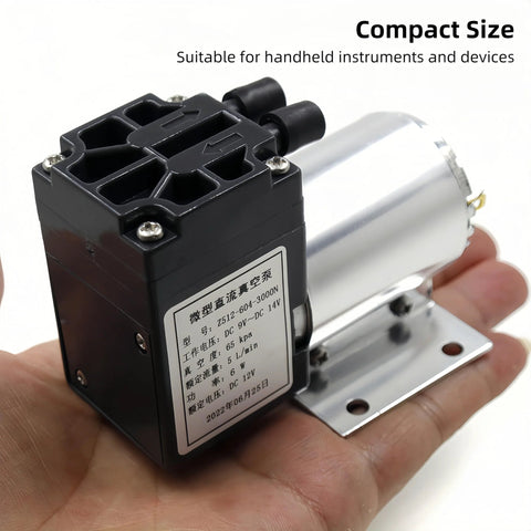 Front view of a DC 12V oil-free vacuum pump with a black valve block and a silver motor on a metal mounting plate.