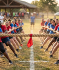 People playing tug of war with Heavy Duty Natural Hemp Rope Do It All 2 Inch Thick By 50 Feet 4 Strand Tight Twisted Jute Rope For Docks Nautical Railings Projects Tug Of War And Home Decor outdoors