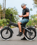 Cyclist on e-bike showing Two Pack Self Sealing Fat Bike Inner Tubes For 20 By 3.0 And 3.5 Tires With 32mm Schrader Valve Puncture Resistant Auto Repair Tubes