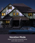 Night view of a house with lights on, showcasing Four Pack Two Point Four GHz WiFi Smart Plugs For Voice Control That Play Nice With Alexa And Google Assistant No Hub Required IFTTT Compatible Remote On Off Via App White in Vacation Mode.