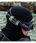Person using MiniQ40 MK2 Dive Light 250 Lumens Hand Free Underwater Torch with Mask Strap in clear water