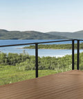 Level Up Your Deck Game With This Sleek Black 36 Inch Face Mount Cable Railing Kit featuring a view of a scenic landscape.