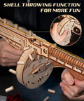 Close-up of 3D Wooden Puzzle Kit For Adults 275 Pieces Submachine Shooter with rubber bands and shell throwing feature in use.