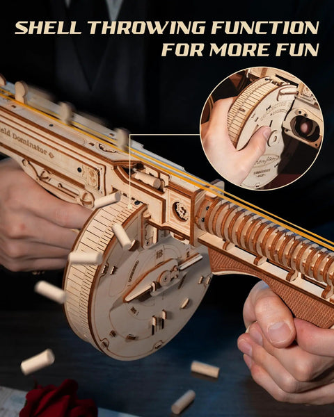 Close-up of 3D Wooden Puzzle Kit For Adults 275 Pieces Submachine Shooter with rubber bands and shell throwing feature in use.