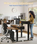 Yihayo Electric Standing Desk With Drawers 48X24 Inches Adjustable Height Computer Table featuring dual users at different heights.