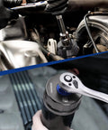 Heavy Duty Oil Filter Wrench With 64mm 14 Flute Aluminum Cartridge Removal Tool in use removing an oil filter.