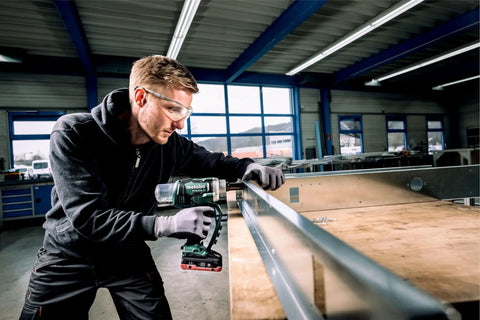 Tough As Nails Cordless Blind Rivet Gun With Brushless Motor Delivers Pneumatic Pace On 18V Batteries in use in a workshop.