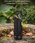 Light Purple 17 In One Tactical Multitool Pliers With Built In Flint Fire Starter And Carabiner Hammer on tree stump