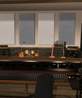 Pro Grade 2 Inch Thick Fiberglass Acoustic Panels With No Fuss Wall Hardware Two Pack Heather Grey installed in a recording studio.